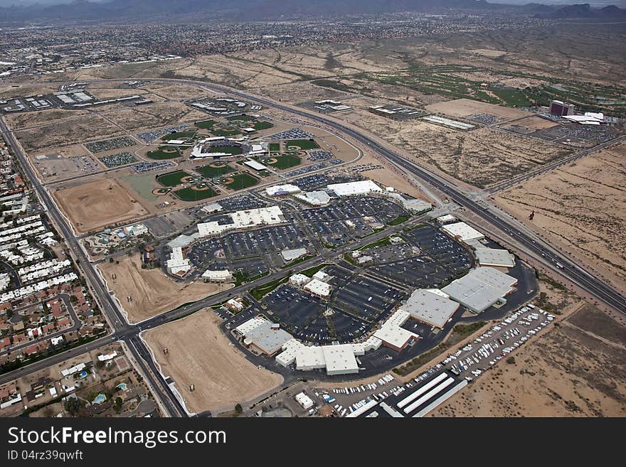 View of a shopping center next to baseball fields and freeway in Scottsdale, Arizona. View of a shopping center next to baseball fields and freeway in Scottsdale, Arizona