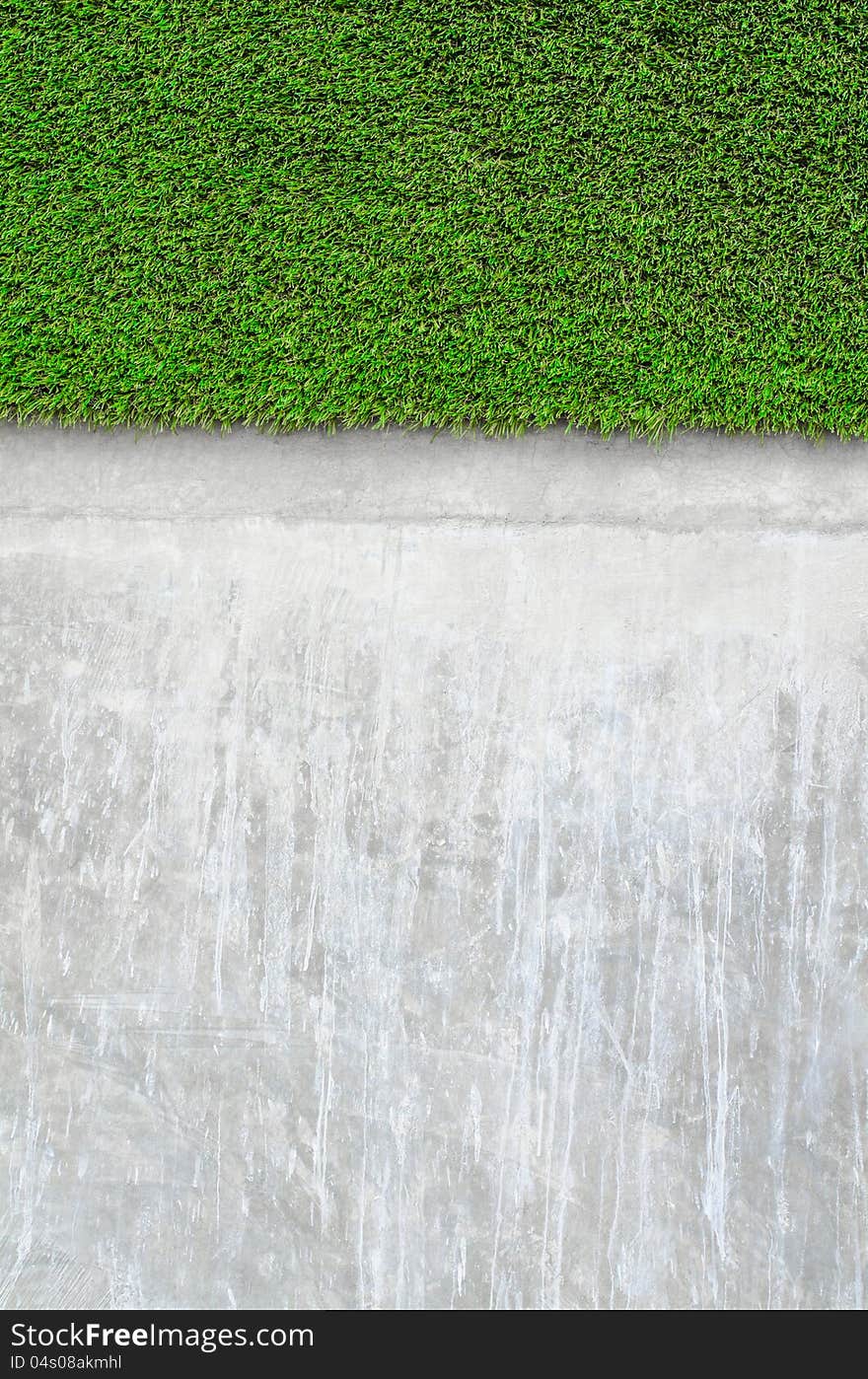 Artificial grass on a cement wall