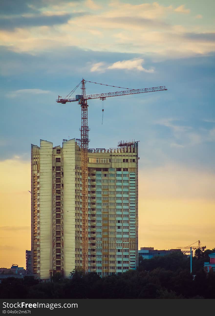 Tower crane and sunset