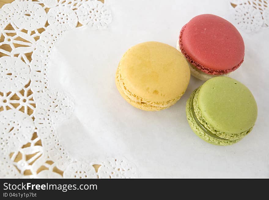 Colorful of french macarons dessert on white background. Colorful of french macarons dessert on white background