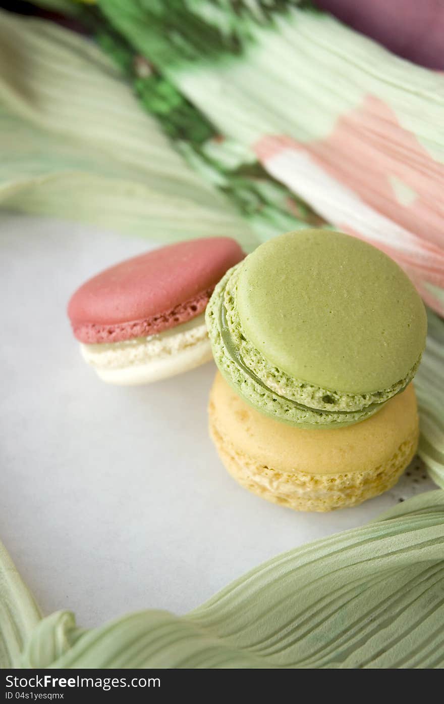 Stack of sweet macarons with soft texture background