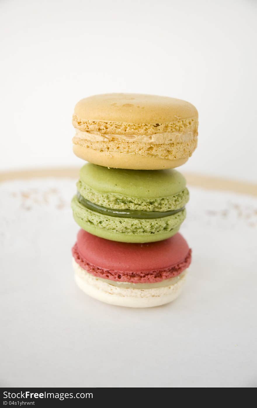 Stack of three color french macarons. Stack of three color french macarons