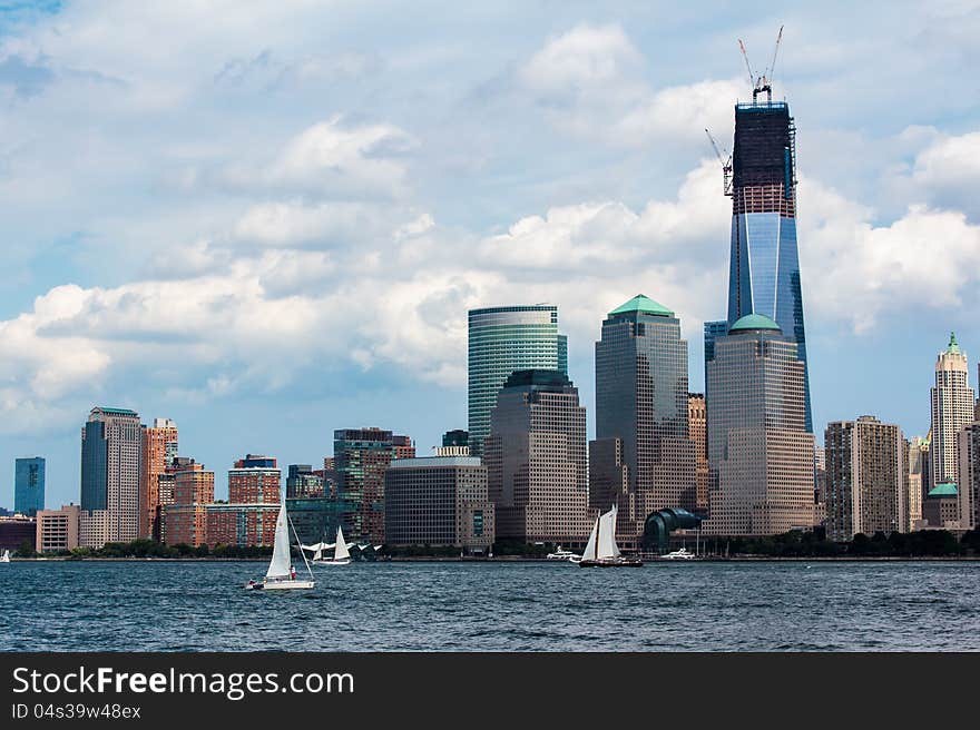 The downtown Skyline of New York City can be seen here from across the Hudson River. The downtown Skyline of New York City can be seen here from across the Hudson River.