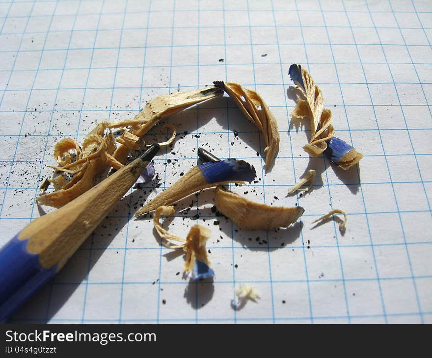 The image of grinded pencil and sawdust from it. The image of grinded pencil and sawdust from it