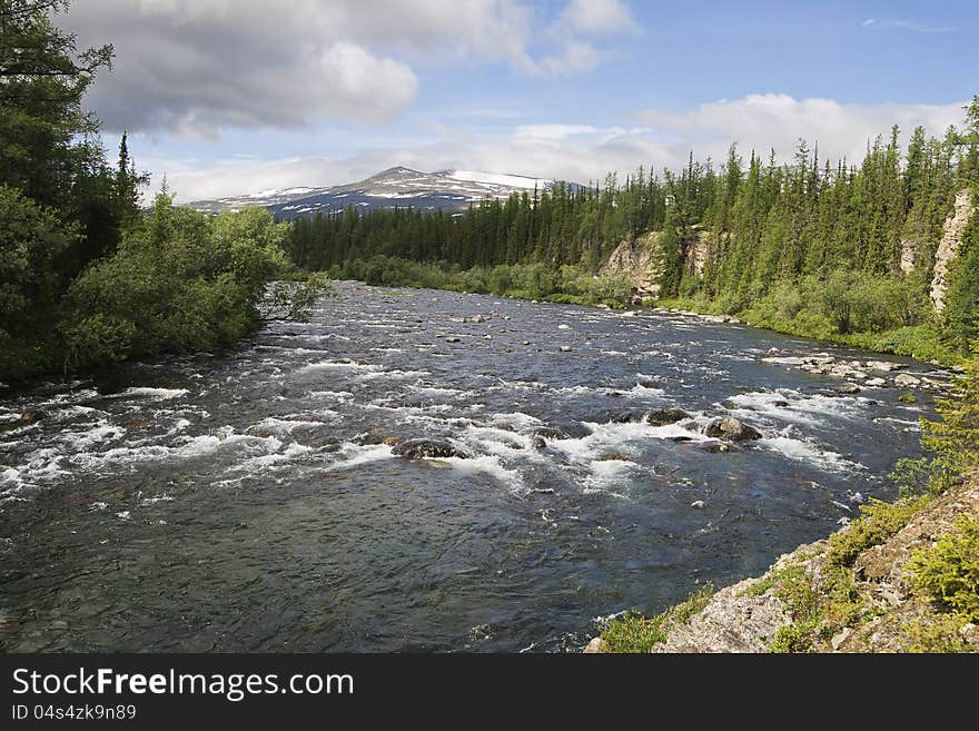 Rapid stream among rocks, Ural, northern Russia. Rapid stream among rocks, Ural, northern Russia