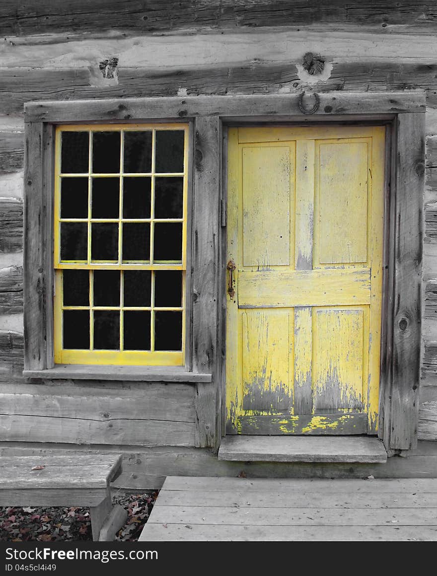 Old yellow wooden door and window.