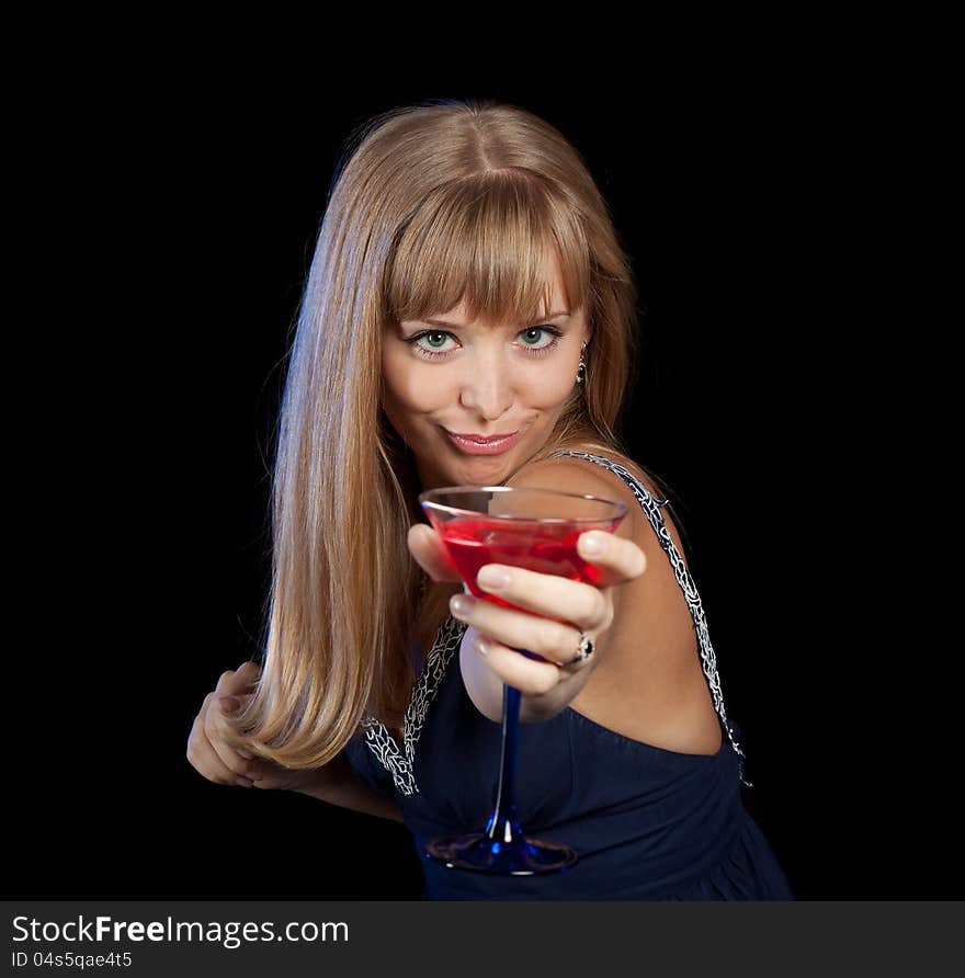 Girl with beverage on disco dancing