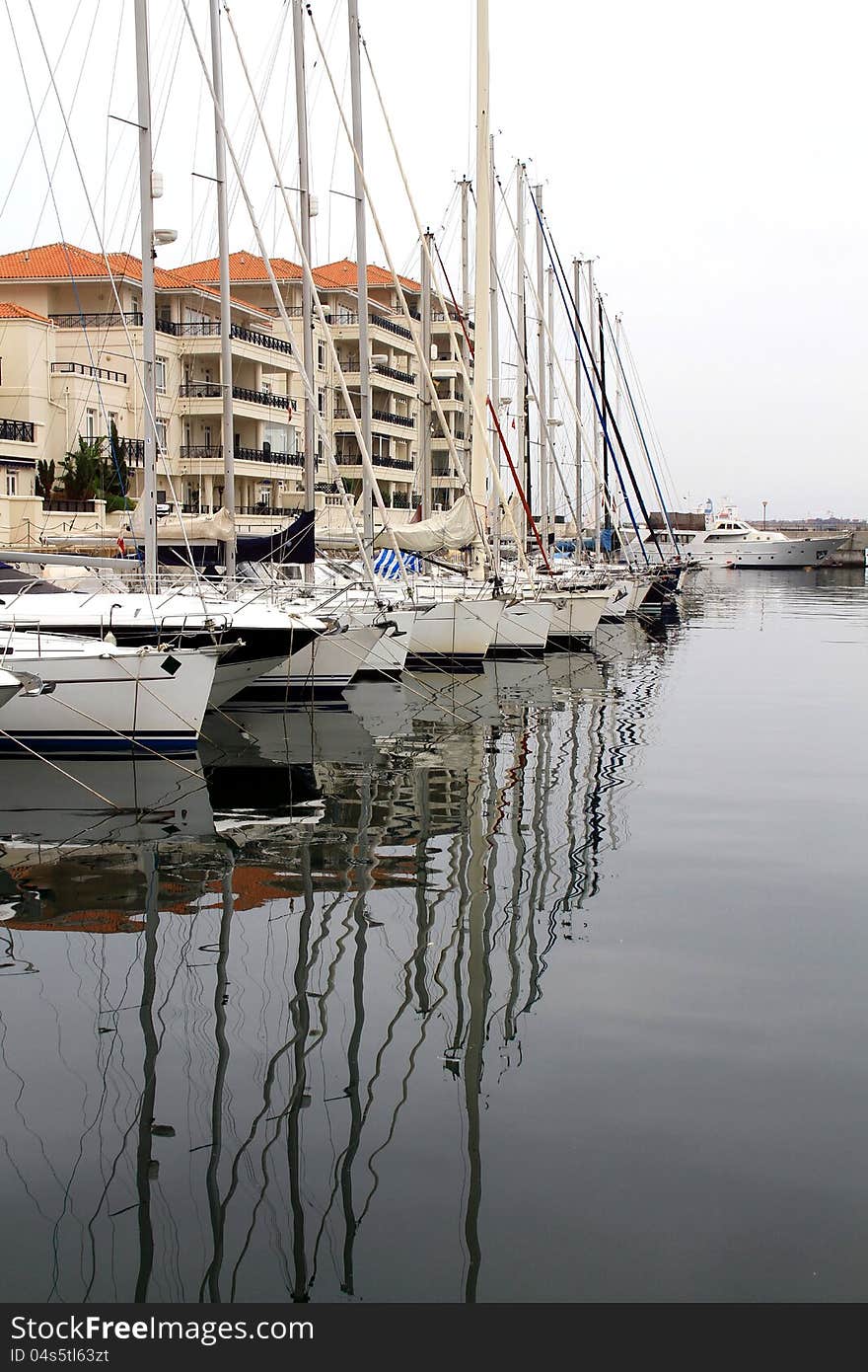 Image of sailboats in still waters