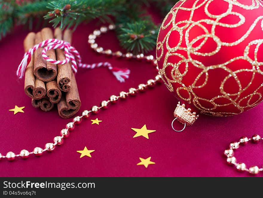 Christmas decoration with  cinnamon and Christmas bauble