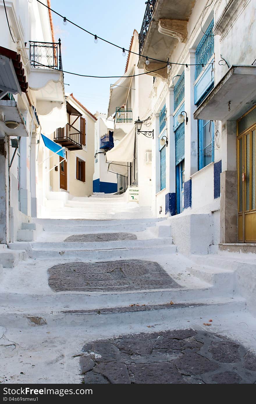 Street With White Road In The Old Village, Greece