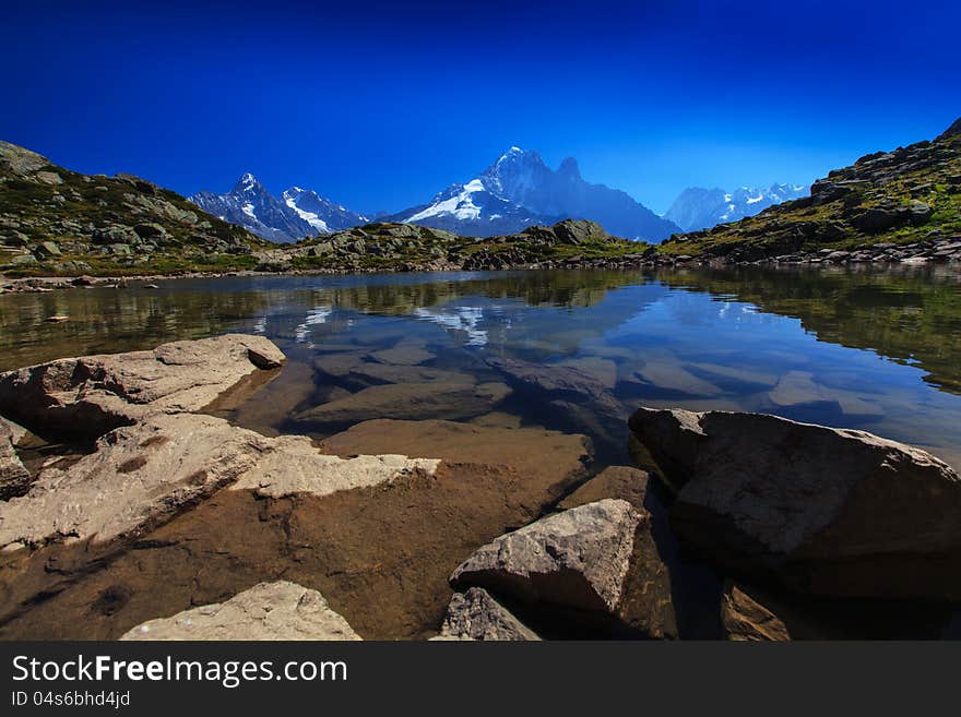 Alpine Lake Reflection In The French Alps