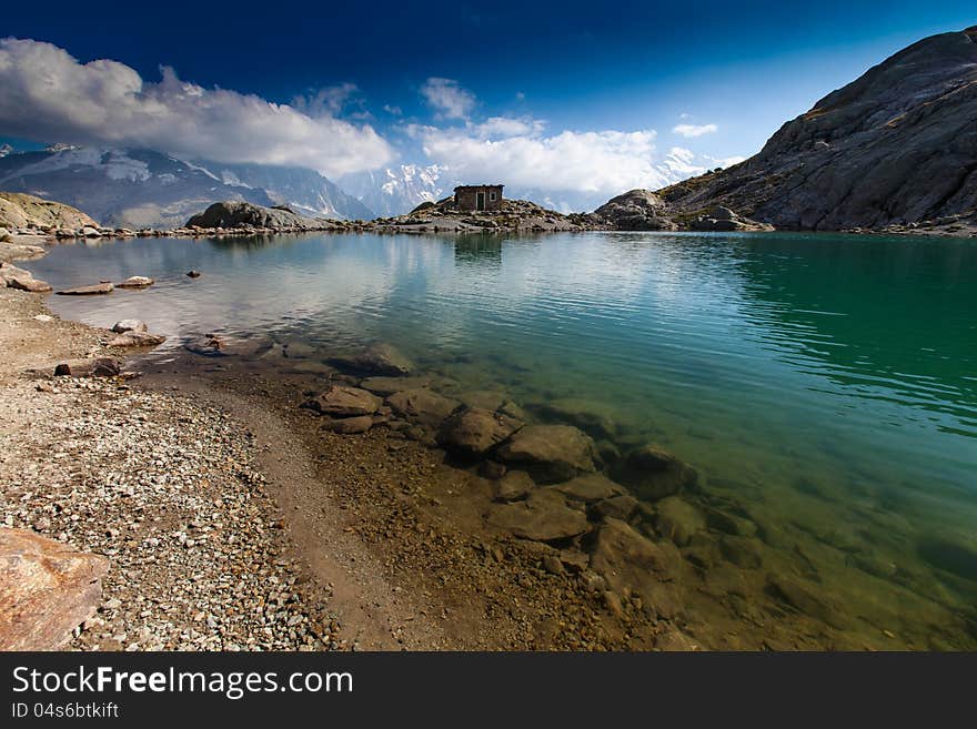 Alpine lake reflection in the French Alps