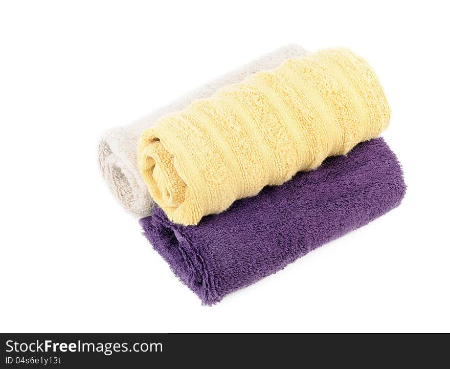 Three towels , on a white background