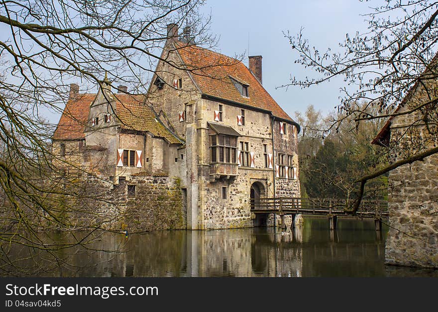 Moated castle Vichering (13th century), located in Germany. Moated castle Vichering (13th century), located in Germany