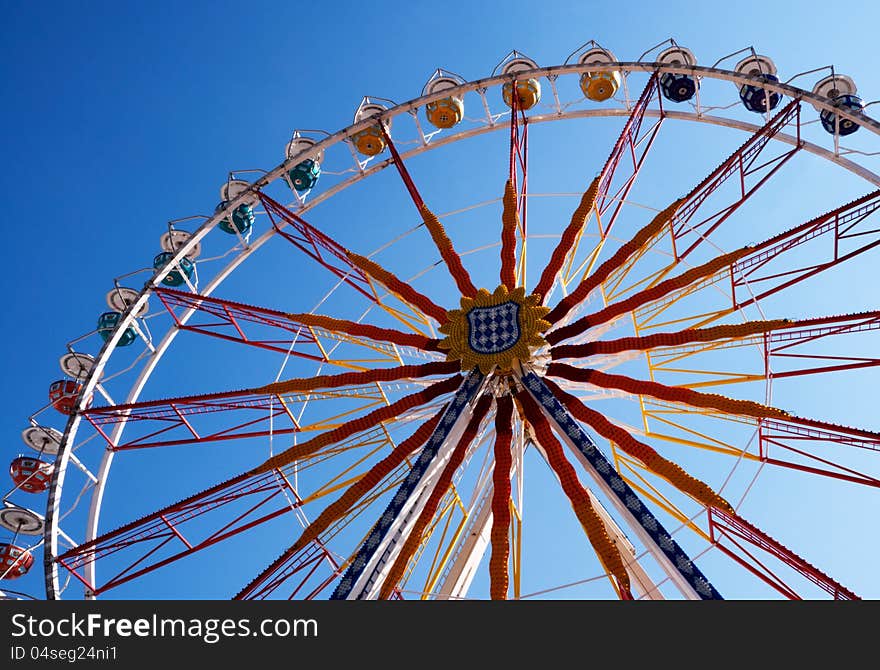 Ferris Wheel horizontal shot with blue sky