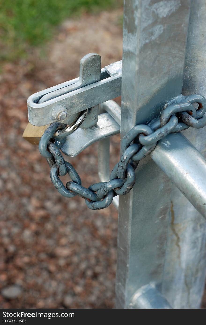 New gate to public playing field showing latch, chain and padlock. This was padlocked open so the gate couldn't be closed for a public event. New gate to public playing field showing latch, chain and padlock. This was padlocked open so the gate couldn't be closed for a public event.