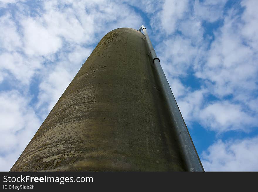 Agriculture farm grain silos in vertical angle facing the sky