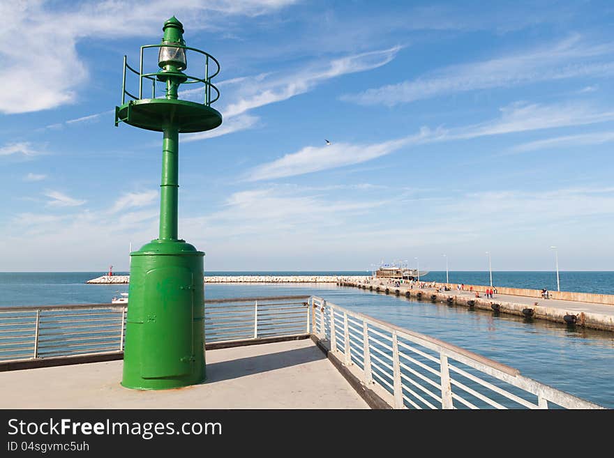 Rimini lighthouse silhouetted on the horizon