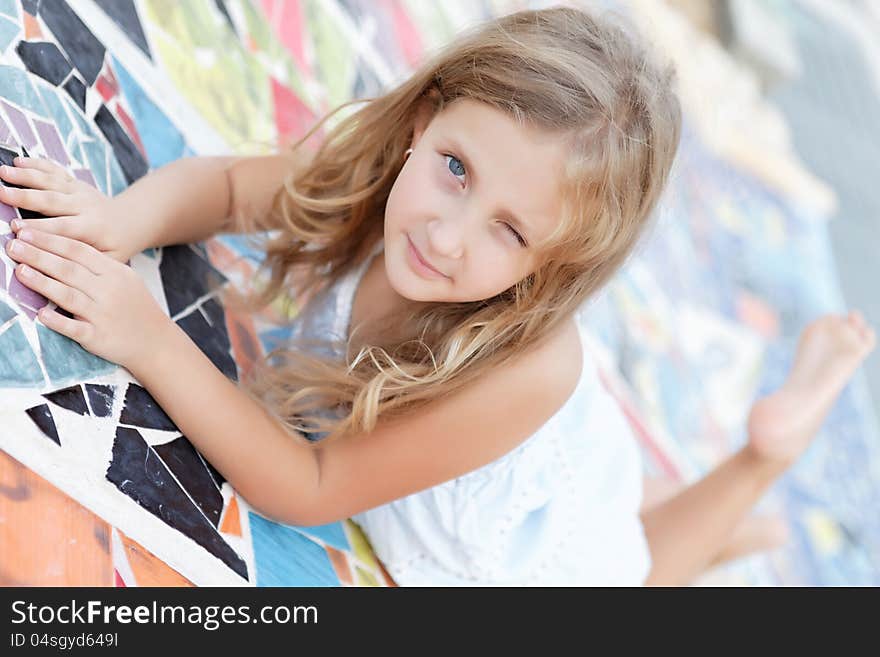 Portrait of a pretty blond girl posing