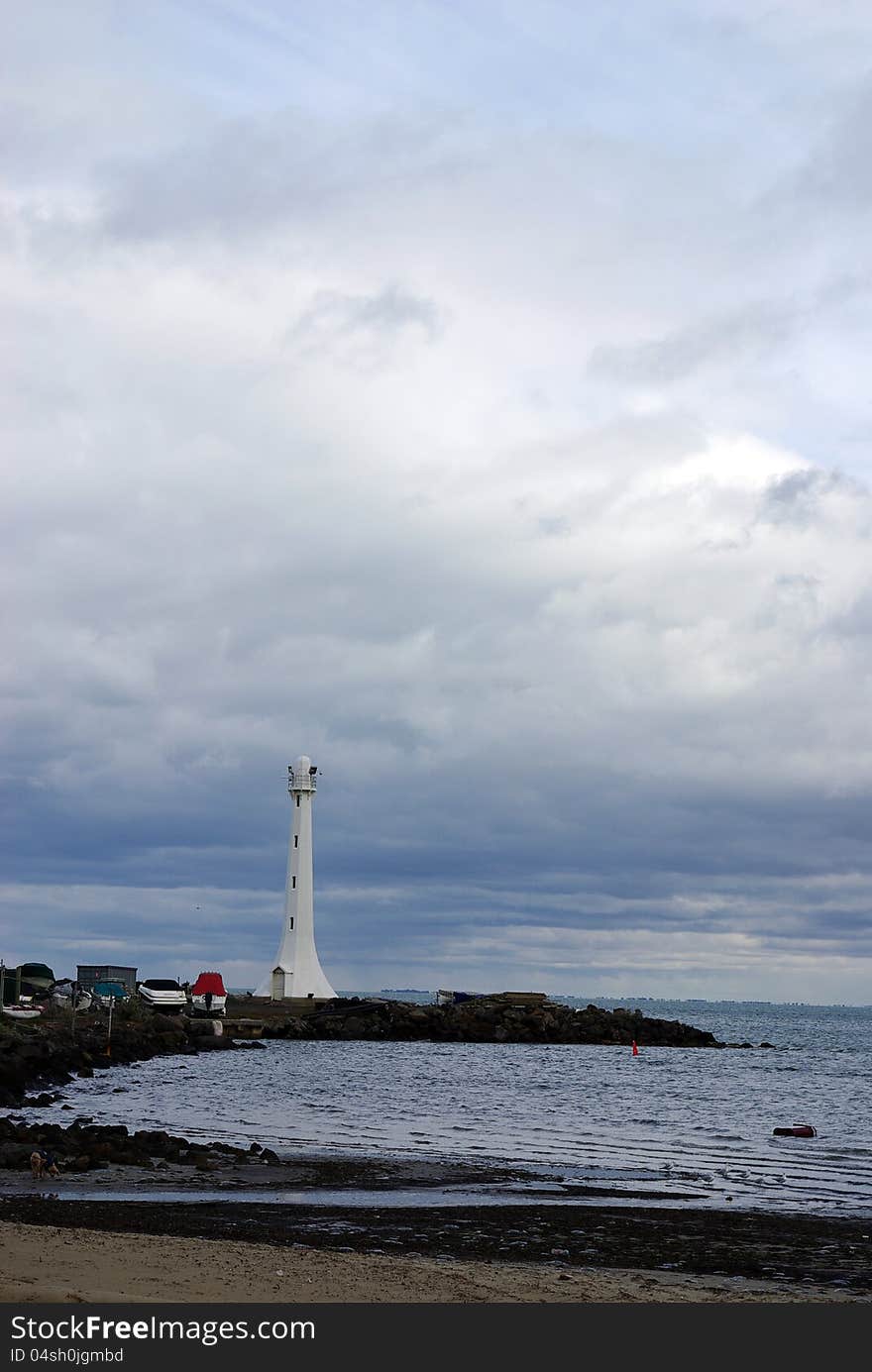 Lighthouse in the south of New Zealand on a spit. Lighthouse in the south of New Zealand on a spit