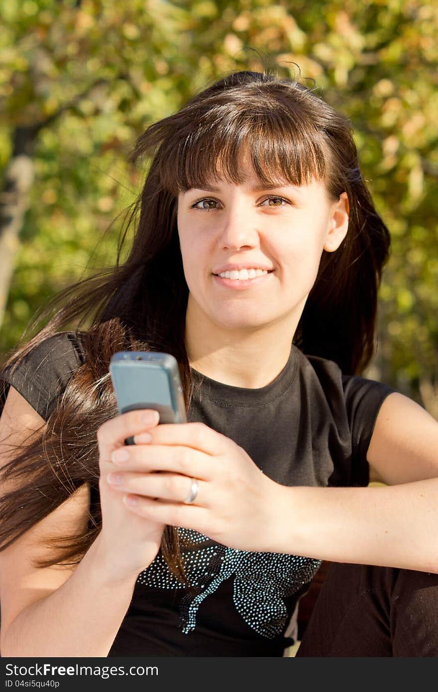 Woman holding mobile phone