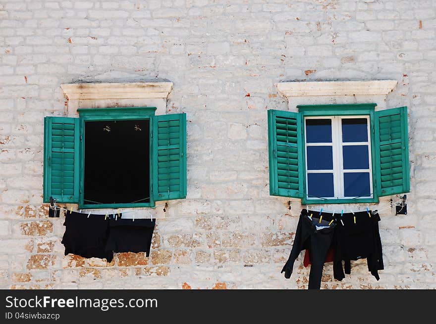 Windows with shutters in old Croatian building. Windows with shutters in old Croatian building