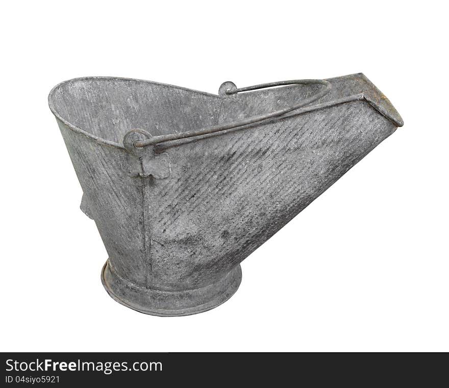 Old metal coal scuttle or bucket isolated.