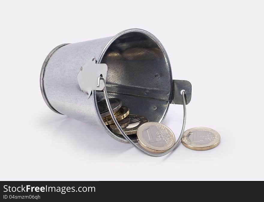 Bucket with euro coins  on white