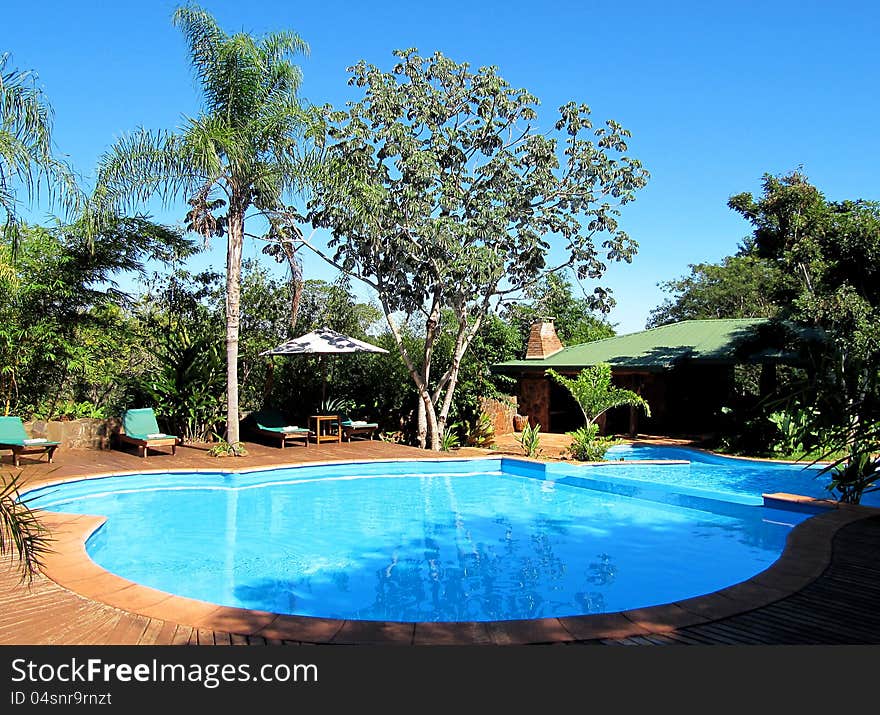 Beautiful swimming pool in resort luxury hotel of South America. Full relaxation and rest. Beautiful swimming pool in resort luxury hotel of South America. Full relaxation and rest.