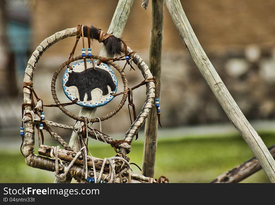 A handmade dreamcatcher is on display.