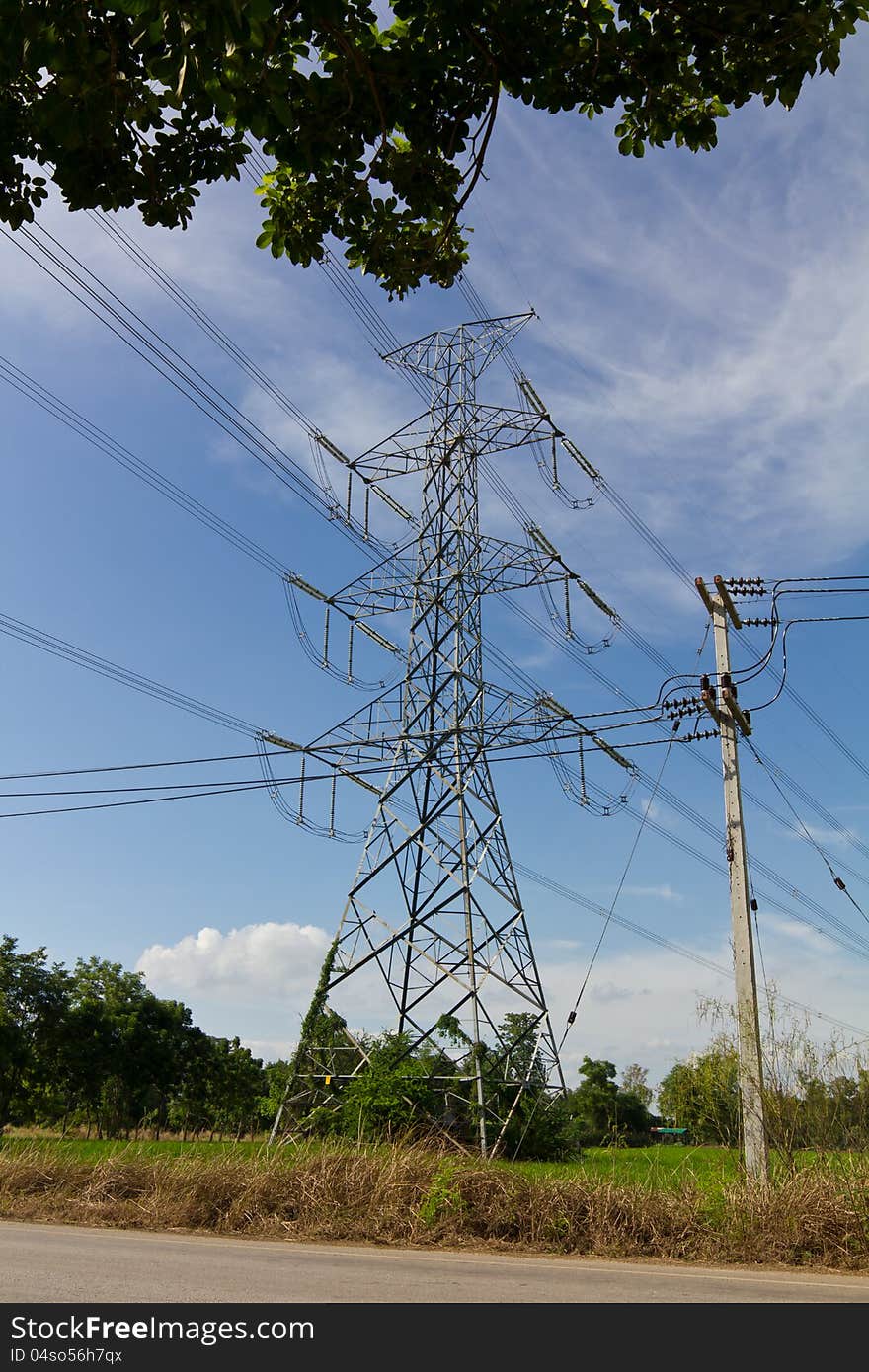 High And Low Voltage Power Poles Near Each Other.