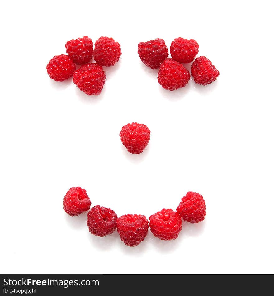 Smile composed of raspberries