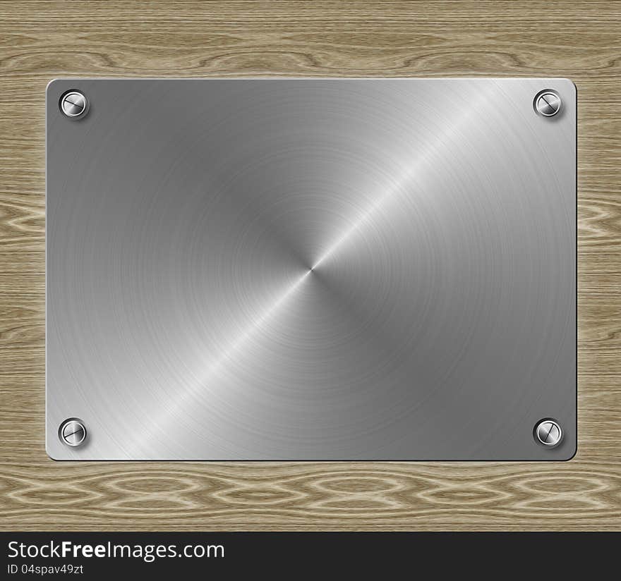 Metal plate on wooden background