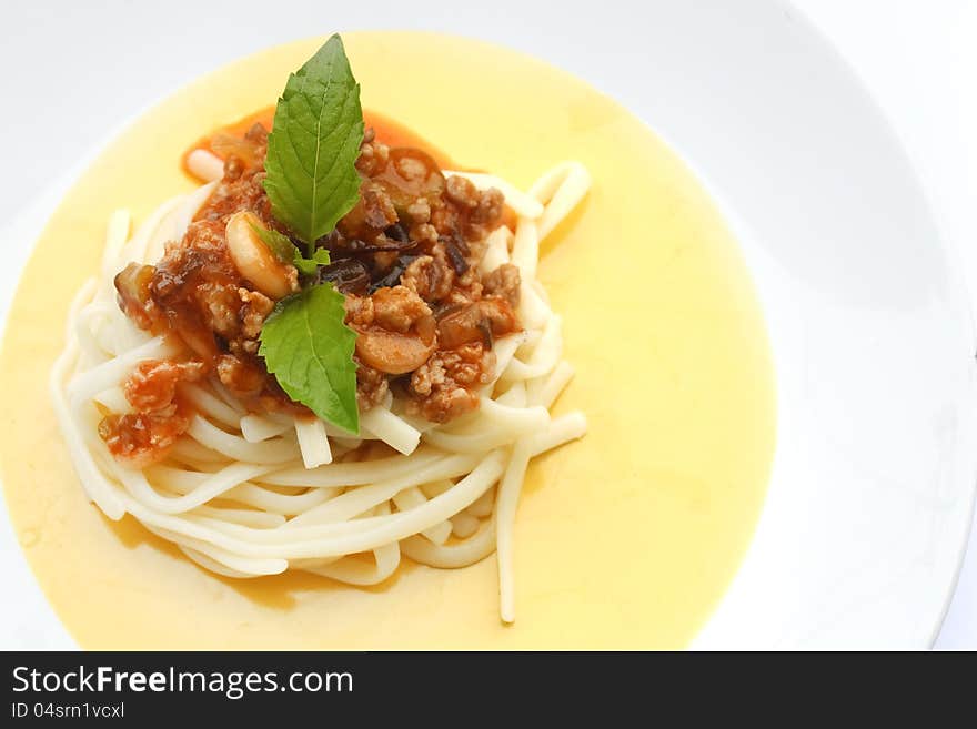 Spaghetti with tomato sauce on plate with white background. Spaghetti with tomato sauce on plate with white background