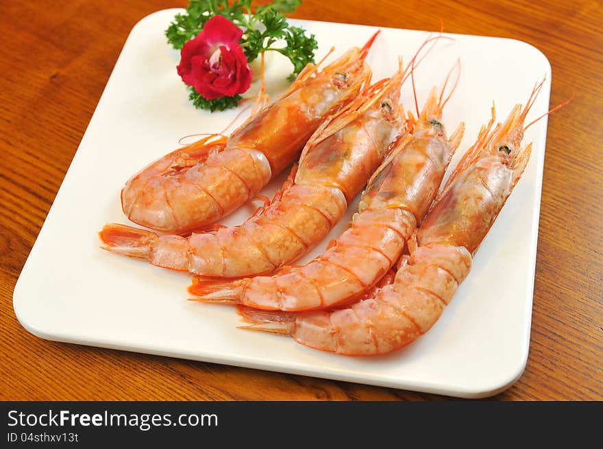 Barbecue; Grilled shrimp on a plate