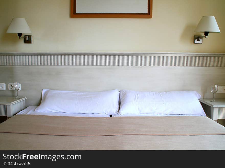 Image of bedroom with glass on a table. Image of bedroom with glass on a table