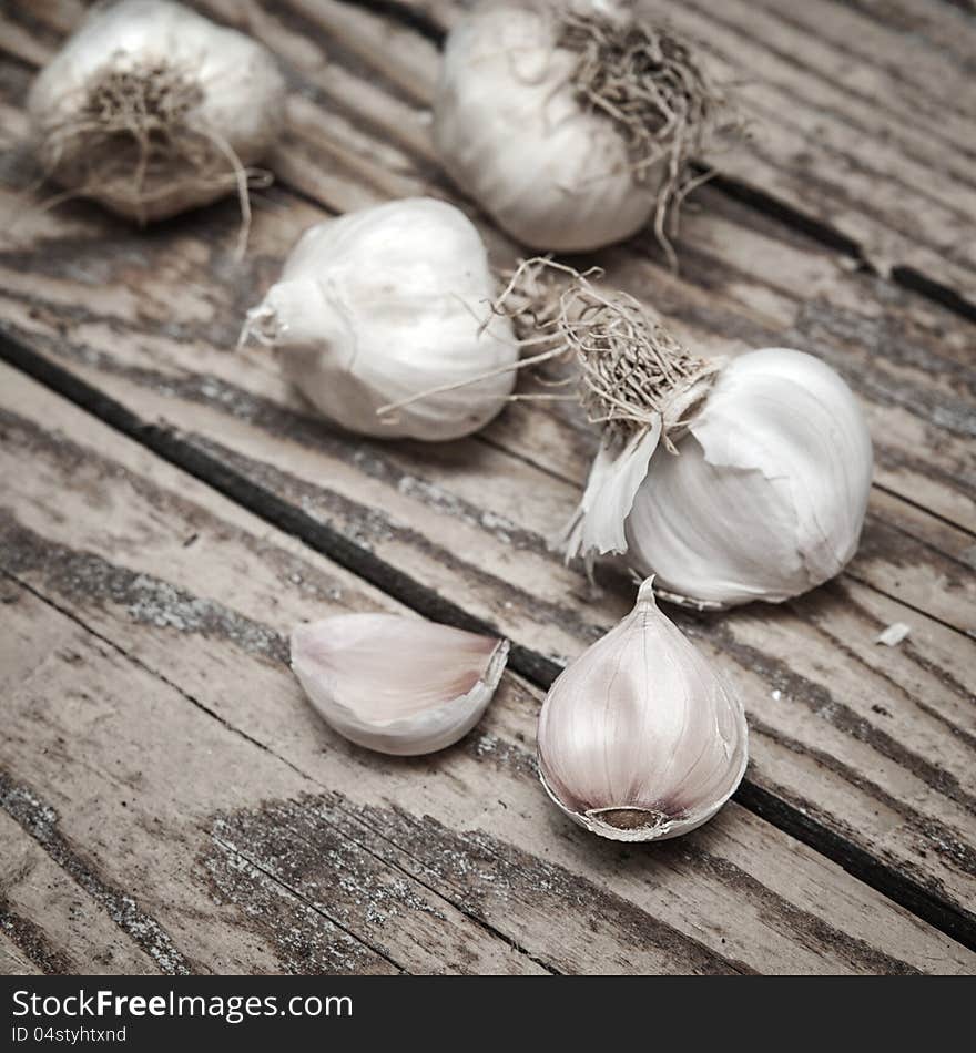 Close up of Garlics on old wood