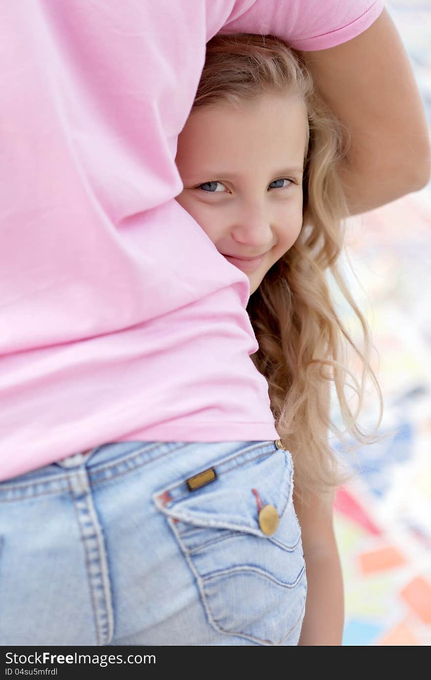 Portrait of blonde girl happy outside