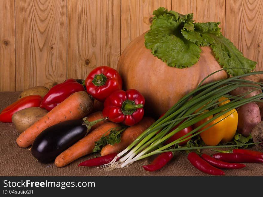 Pumpkin and fresh autumn vegetables gathered from the garden