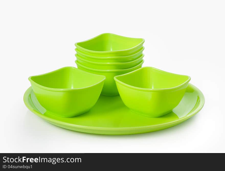 Close up of plastic microwave bowl and plate isolated over white. Close up of plastic microwave bowl and plate isolated over white