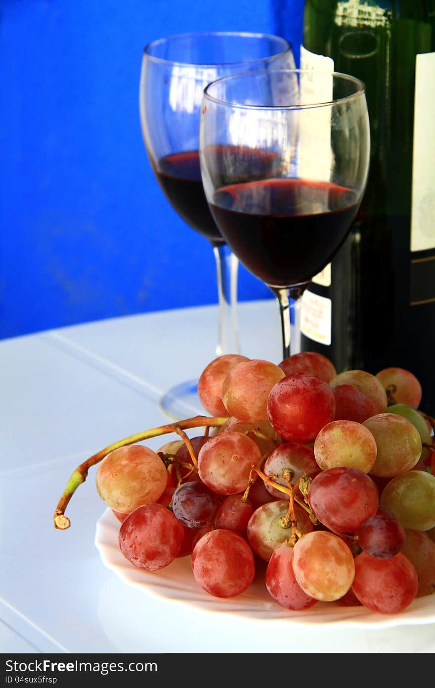 Image of two glasses on a new years day with grapes. Image of two glasses on a new years day with grapes