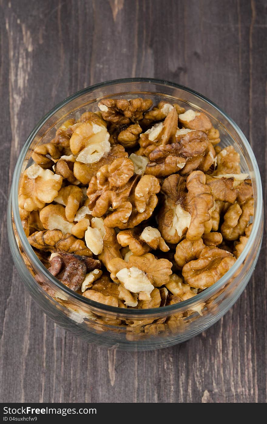 Walnuts in a glass jar closeup