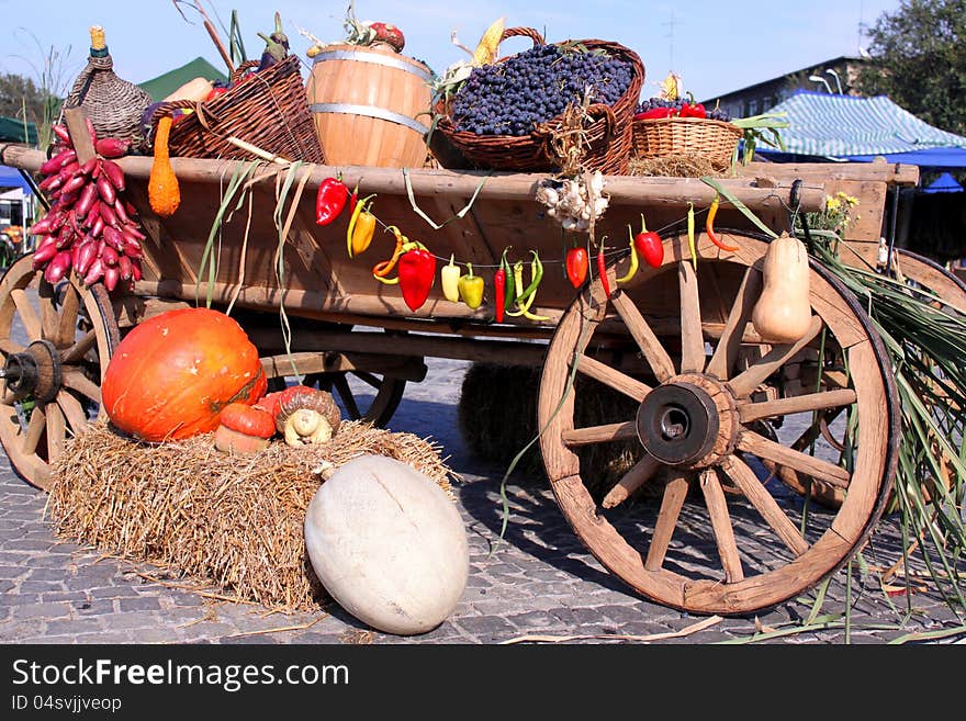 Autumn vegetables on the wooden wagon outdoor