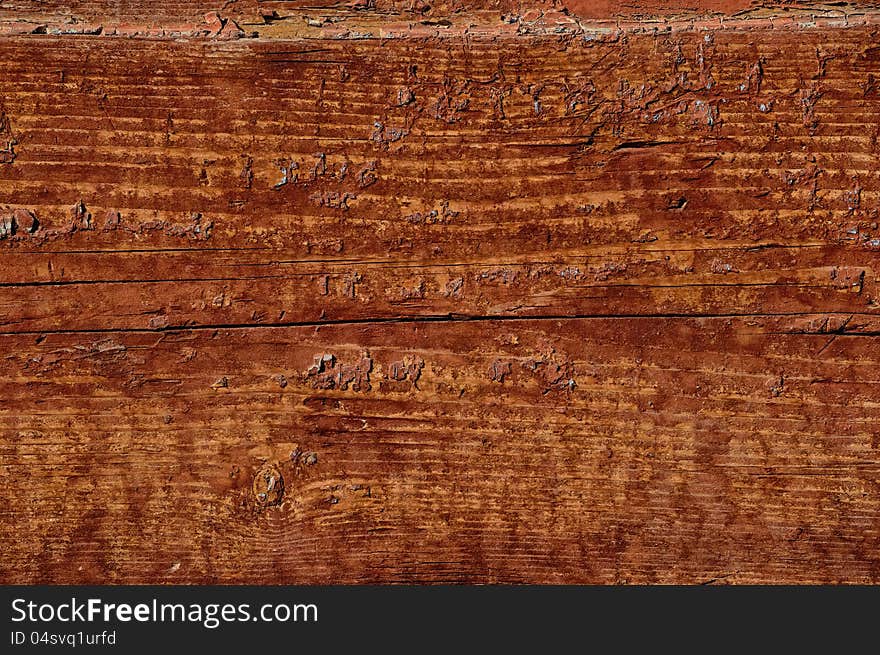 Old wooden wall with cracked paint traces. Old wooden wall with cracked paint traces