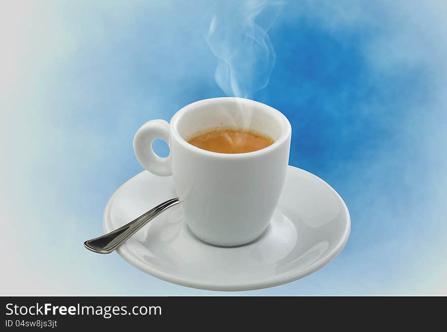 Coffee smoking on the blue sky background