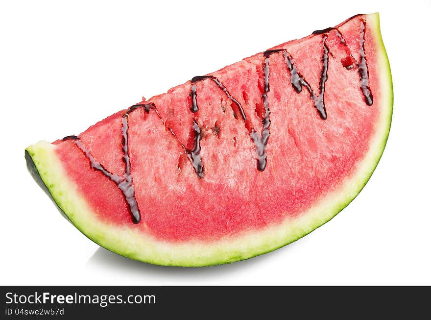 Watermelon and chocolate sliced close up on the white