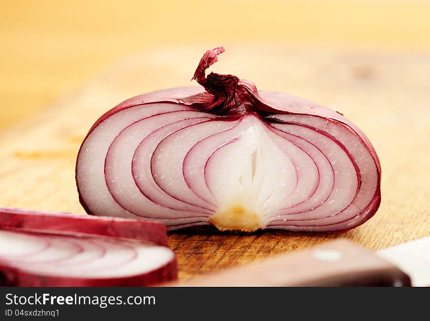 Red onion, sliced in half. Red onion, sliced in half