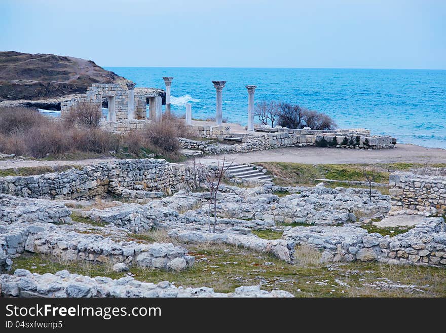 Landscape with the sea, waves and ruins of the ancient Khersones city in Crimea. Ukraine