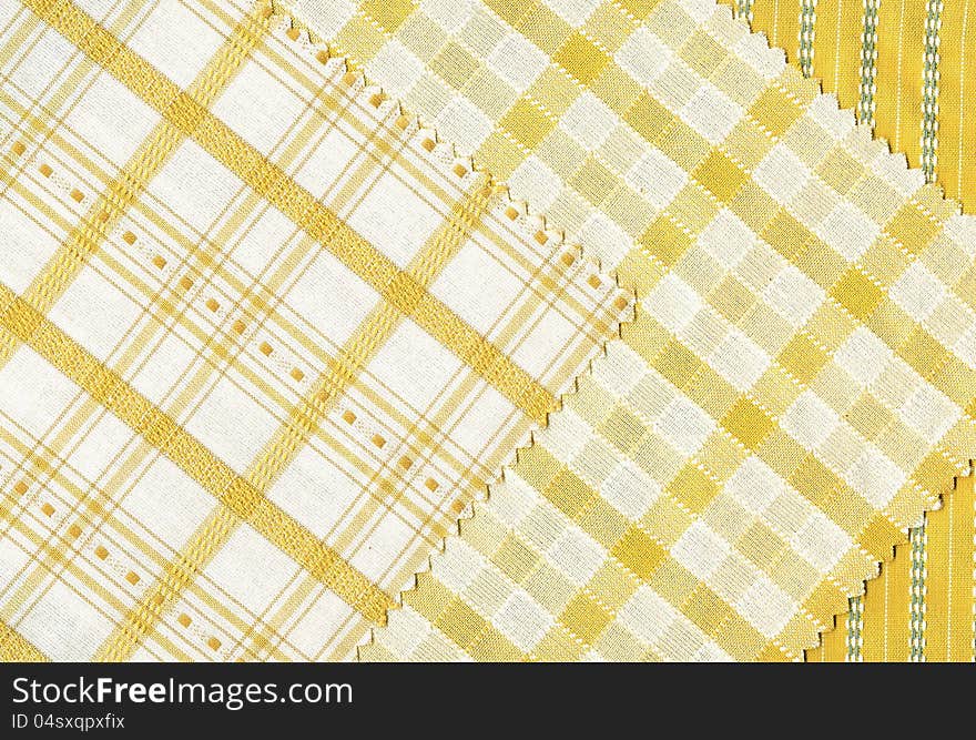 Scan of three samples of cotton in yellow and white colors. Scan of three samples of cotton in yellow and white colors.