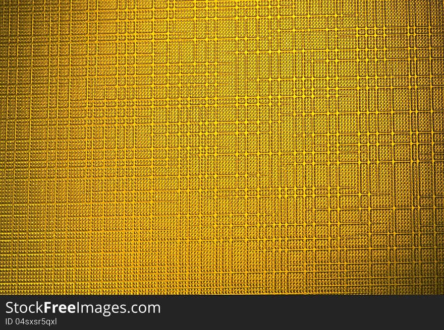 Plastic plate texture background with golden color